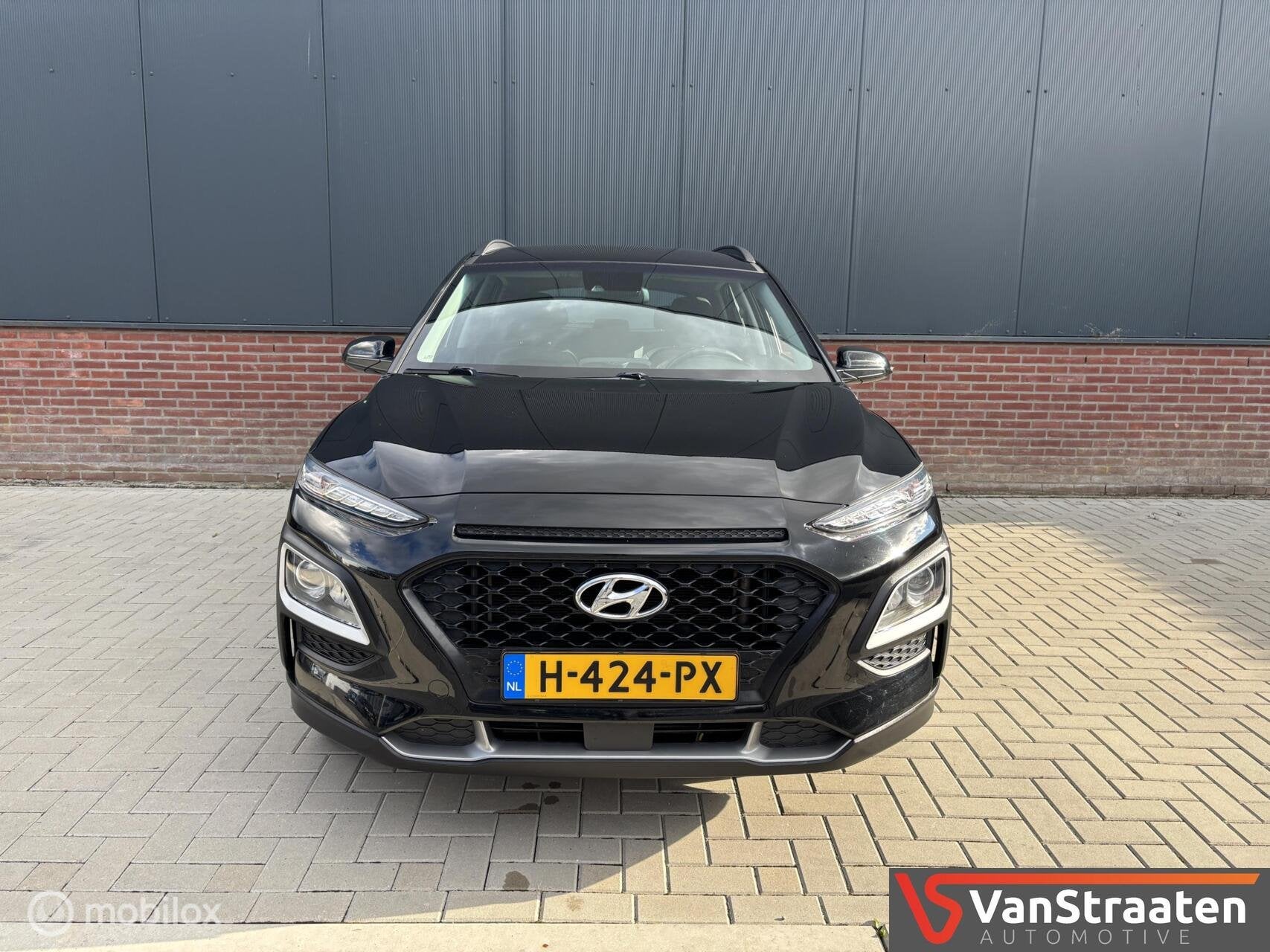 Hyundai Kona 1.0T Comfort | Carplay | Camera | Stoelverwarmi, Voorwielaandrijving, Stof, Gebruikt, Zwart