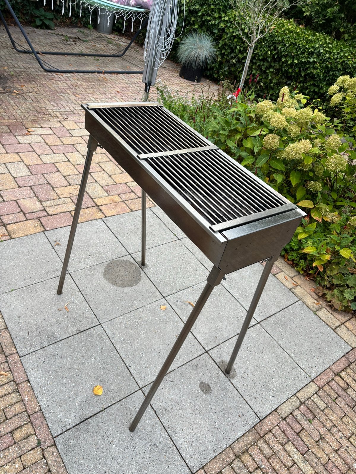 Slagersbarbecue RVS houtskool, Ophalen, Zo goed als nieuw