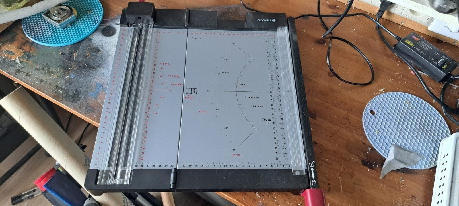 Papiersnijmachine, Ophalen