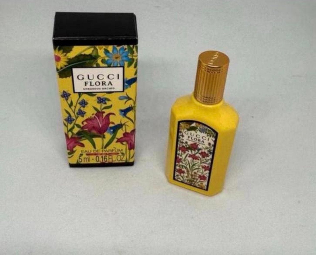 Parfum miniatuur Gucci Flora gorgeous Orchid 5 ml edp, Verzamelen, Parfumverzamelingen, Verzenden, Nieuw, Miniatuur, Gevuld