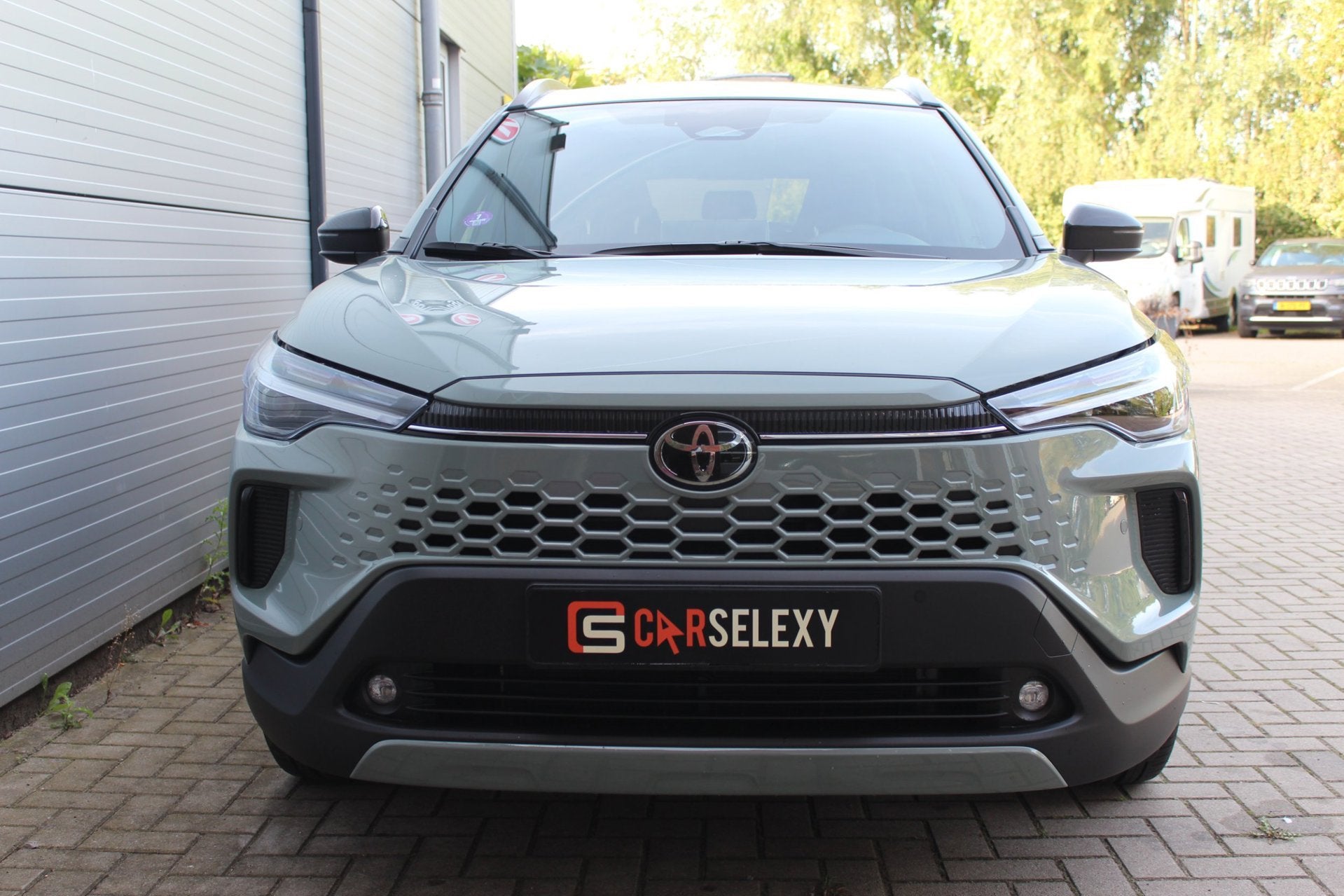Toyota Corolla Cross Hybrid 140 Dynamic Trekhaak/winterpakke, Auto's, Stof, Gebruikt, 4 cilinders, Met garantie (alle)