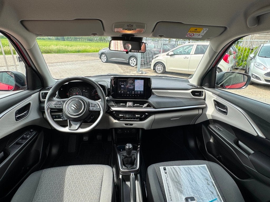 Suzuki Swift 1.2 Select Smart Hybrid CAMERA / PARKEERSENSORE, Auto's, Stof, Gebruikt, Zwart, Bedrijf