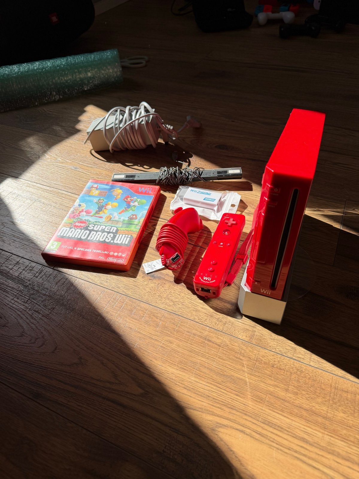 Rode Nintendo Wii met WiiHDMI en Super Mario Bros. Wii, Spelcomputers en Games, Ophalen of Verzenden, Gebruikt, Met 1 controller