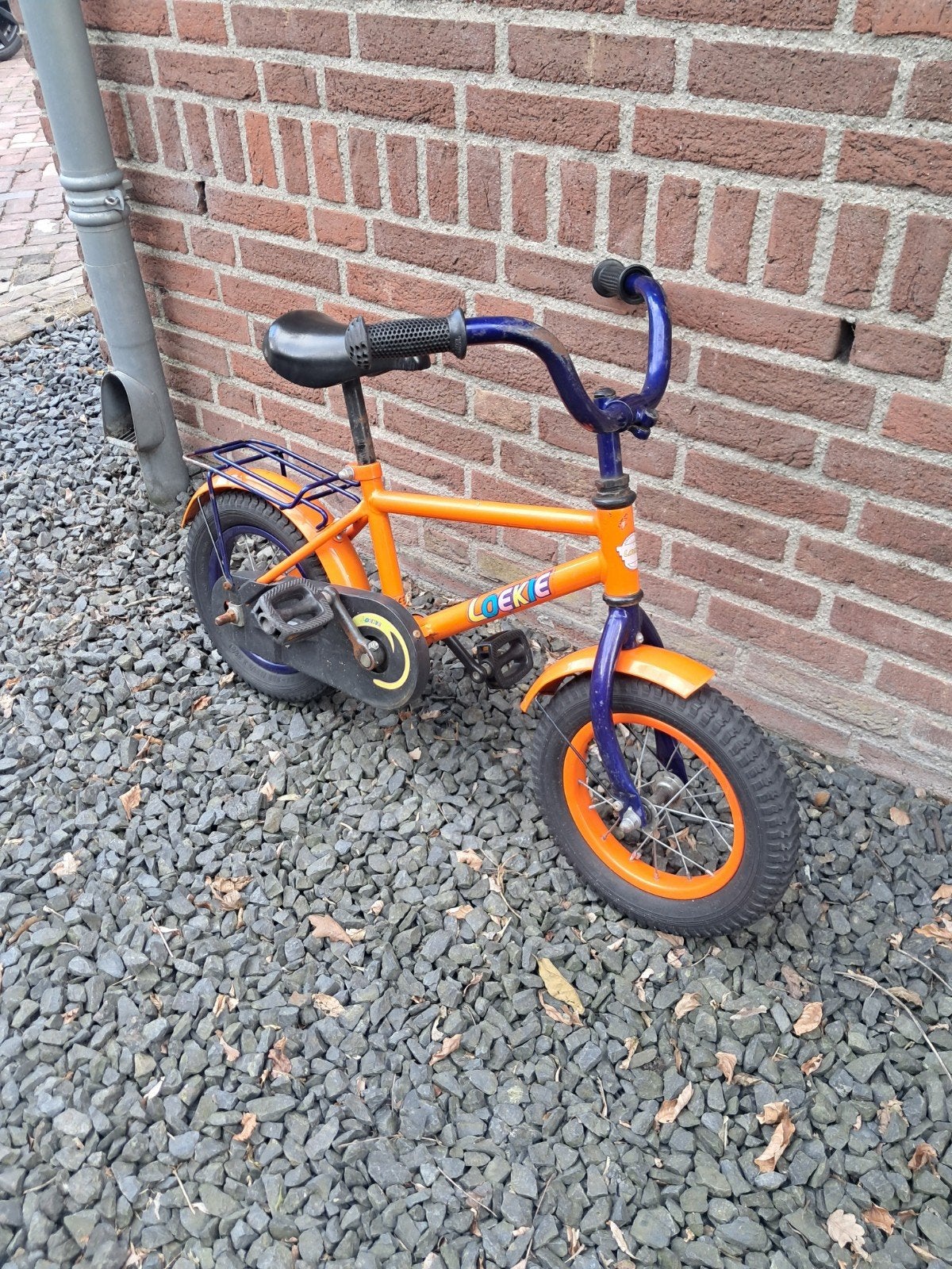 Loekie kinderfiets 12,5 inch - Oranje, Fietsen en Brommers, Fietsen | Kinderfietsjes, Ophalen, Terugtraprem, Gebruikt, Loekie