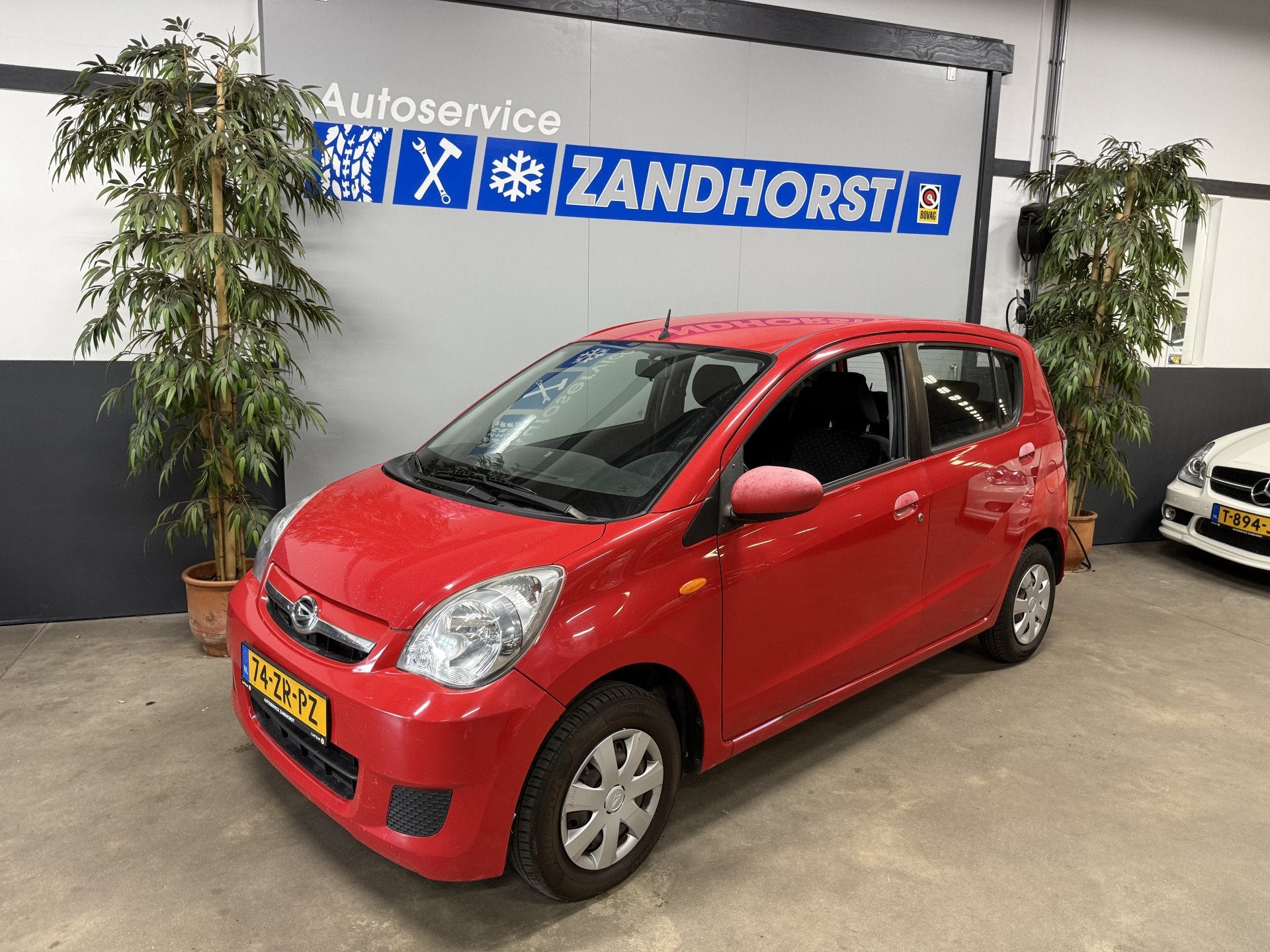 Daihatsu Cuore 1.0 Premium // APK tot 16-06-2027! (bj 2008), Auto's, Daihatsu, Voorwielaandrijving, 18 €/maand, Elektrische ramen