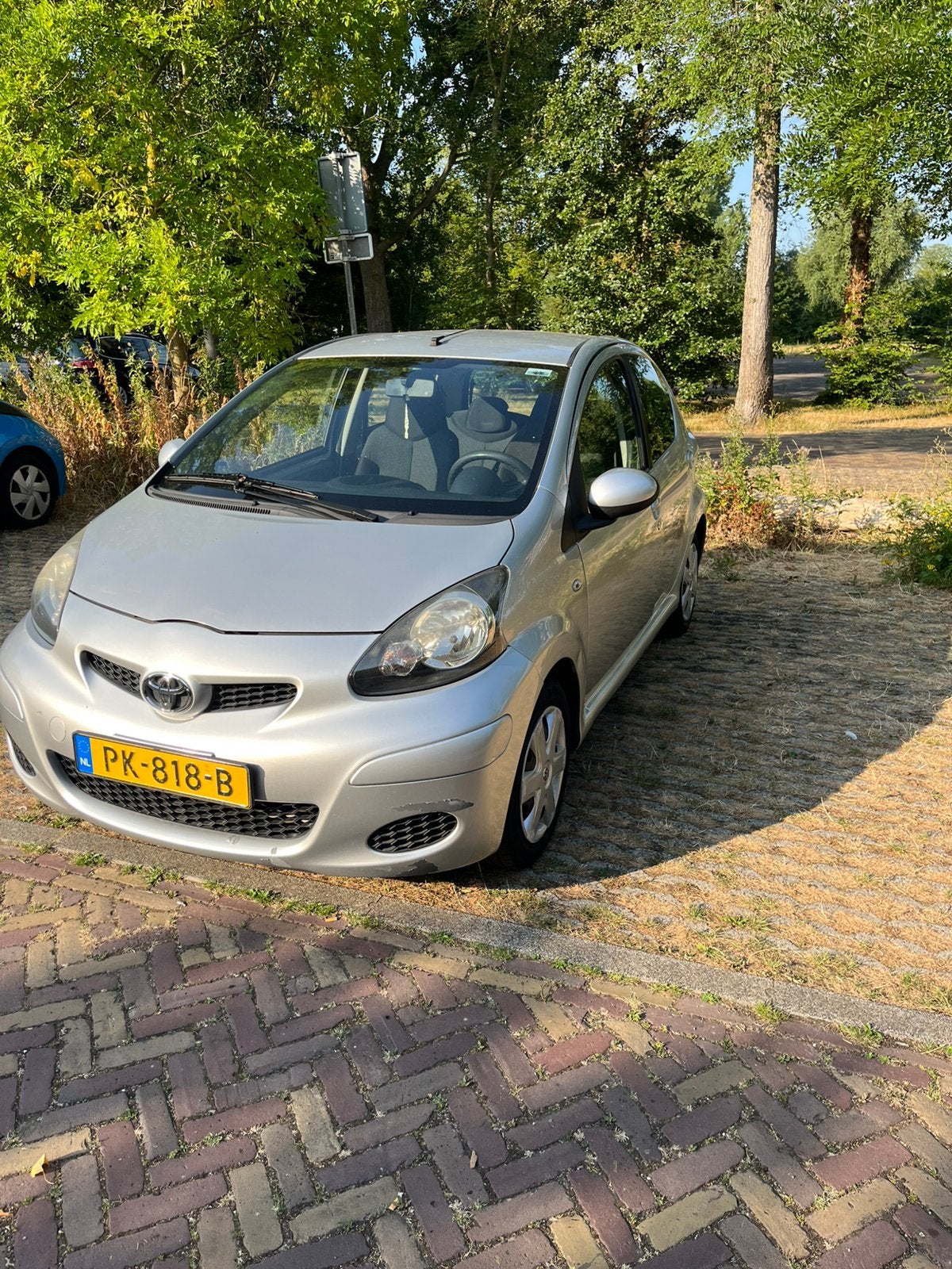 Toyota Aygo 1.0 12V Vvt-i 5DRS 2010 Grijs, Voorwielaandrijving, Stof, Zwart, 4 stoelen
