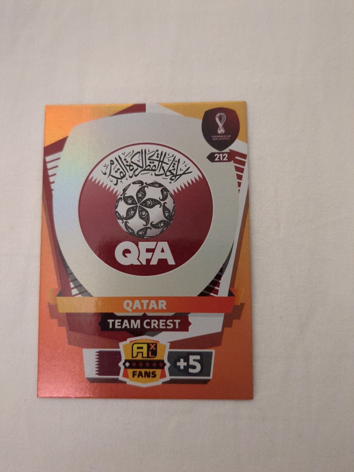 FIFA World Cup Qatar 2022 Adrenalyn XL QFA Team Crest, Ophalen of Verzenden, Zo goed als nieuw, Overige sporten, Spelerskaart