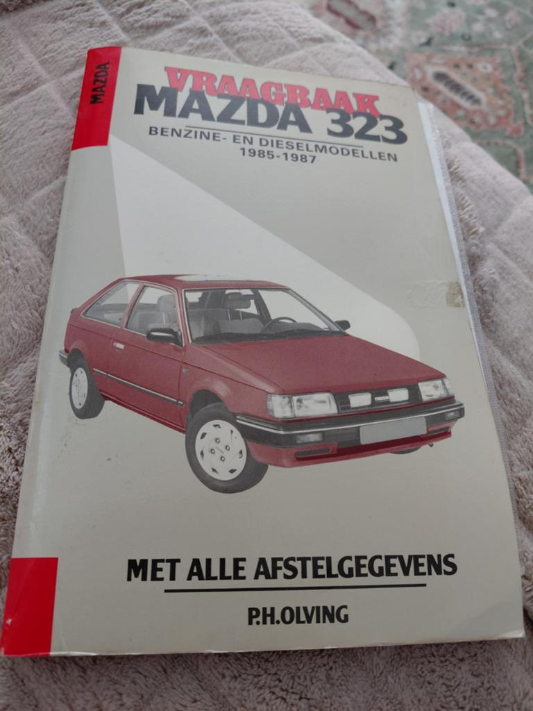 Vraagbaak Mazda 323 Benzine- en Dieselmodellen 1985-1987, Ophalen of Verzenden, Gelezen, Mazda, P.H. Olving