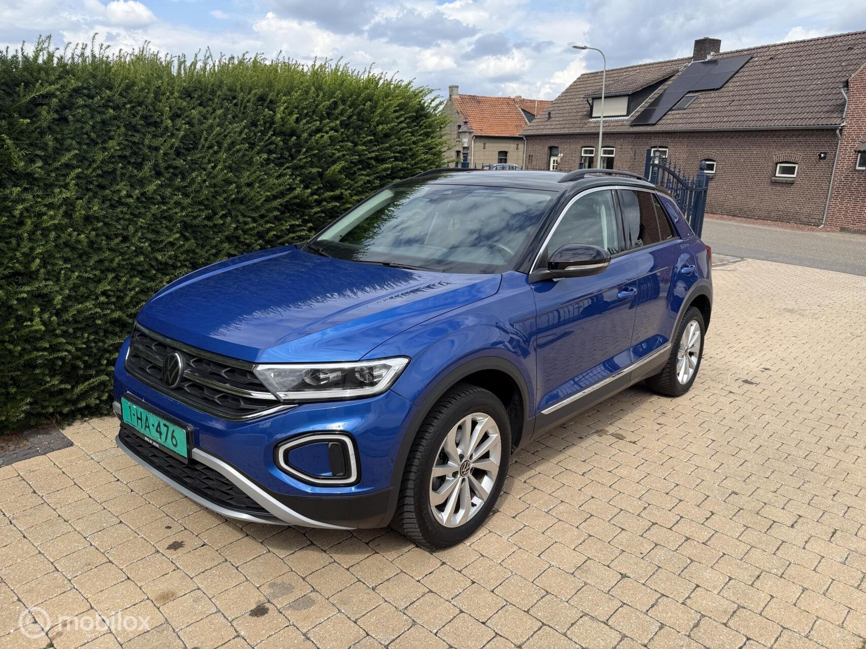 Volkswagen T-Roc 1.5 TSI Style 27.000 KM AUTOMAAT NIEUWSTAAT, Auto's, Volkswagen, 1258 kg, Zwart, 150 pk, Blauw