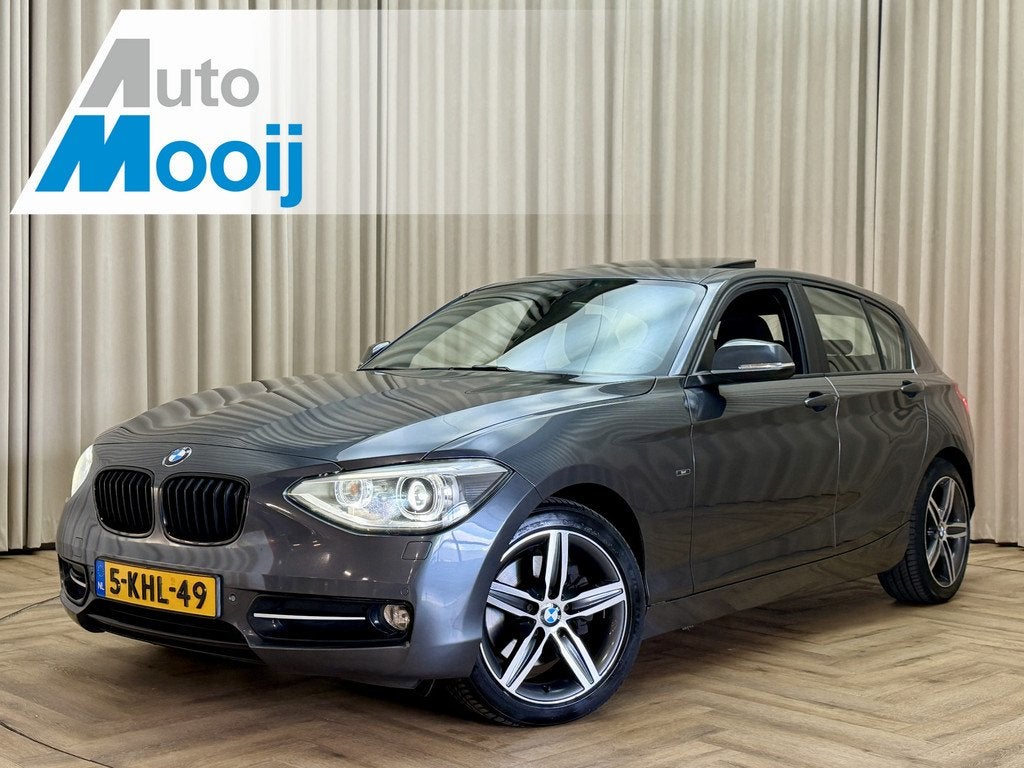 BMW 1-serie 125i *Sportline* Leder / Schuif/Kanteldak / Navi, Auto's, 1-Serie, Euro 5, Gebruikt, 4 cilinders