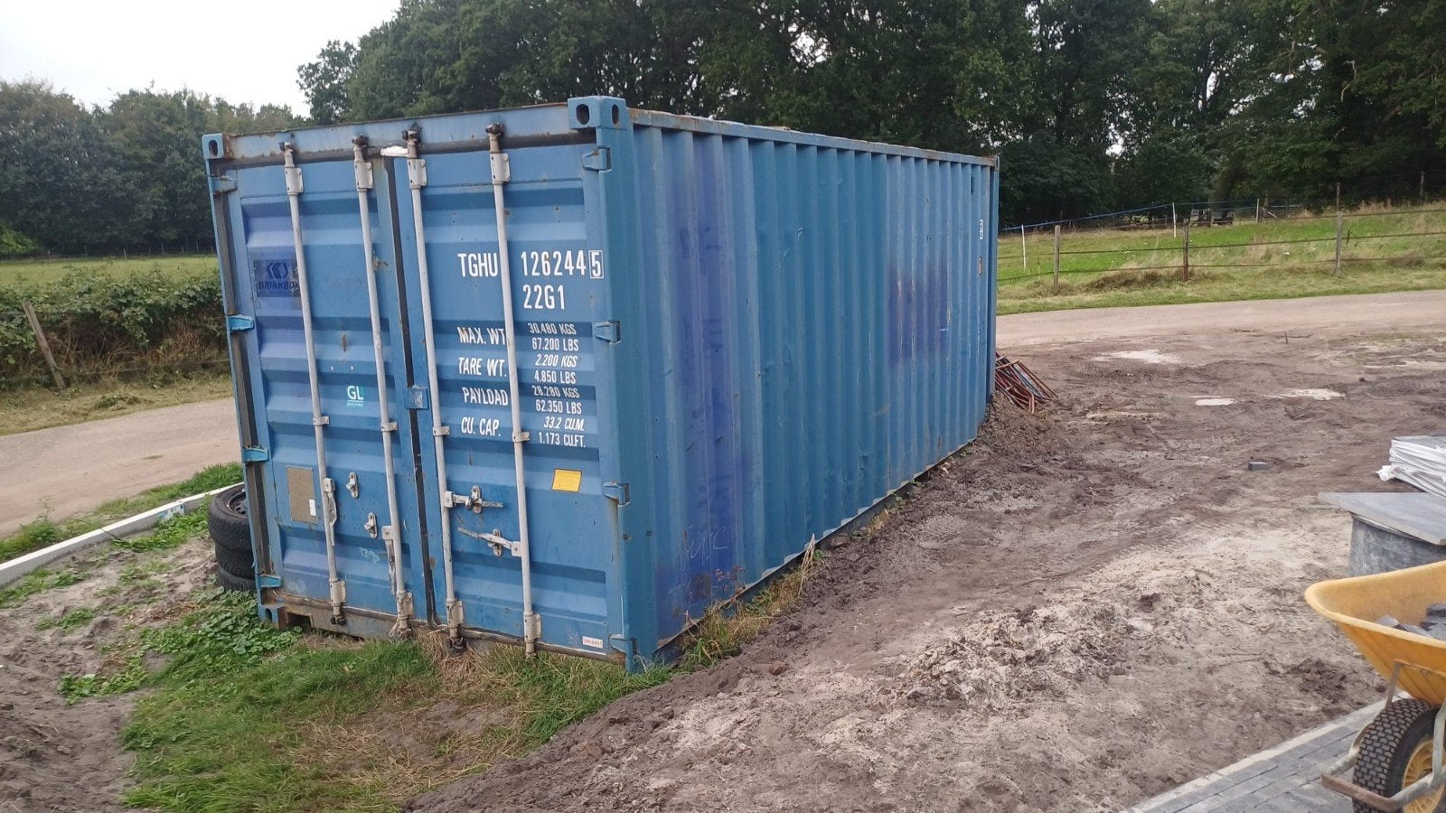 20ft zeecontainer met stelling, Ophalen