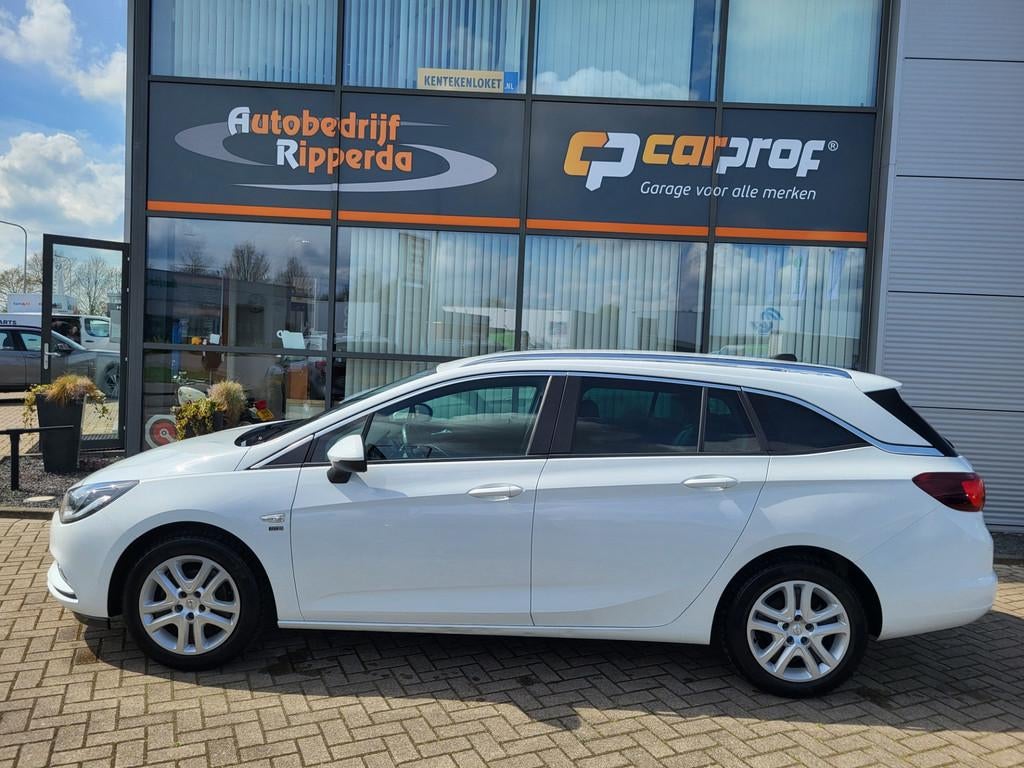 Opel Astra Sports Tourer 1.0 Turbo 120 Jaar Edition, Auto's, Opel, Gebruikt, Euro 6, 1178 kg, 620 kg