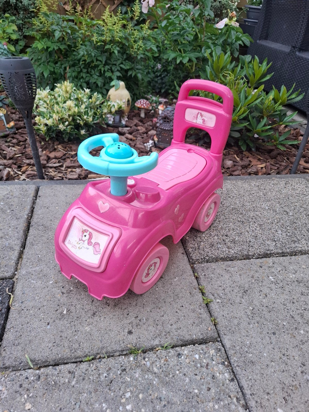 Loopauto roze met unicorns, Ophalen