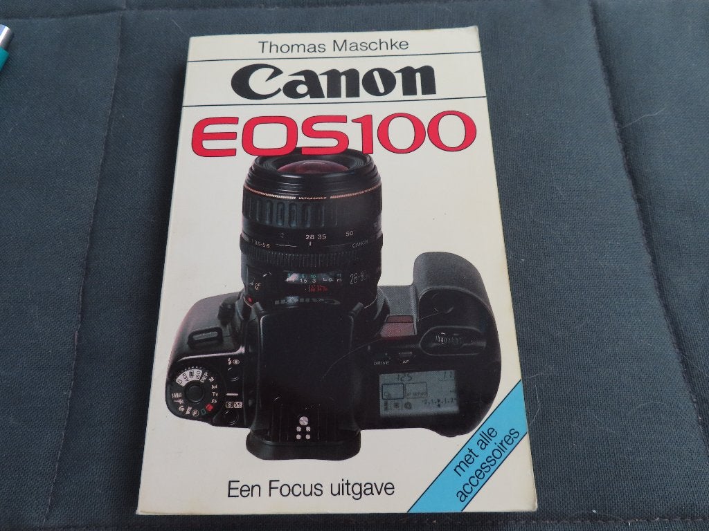 Canon 100 camera boek, Audio, Tv en Foto, Fotocamera's Analoog, Ophalen of Verzenden, Zo goed als nieuw, Spiegelreflex, Canon