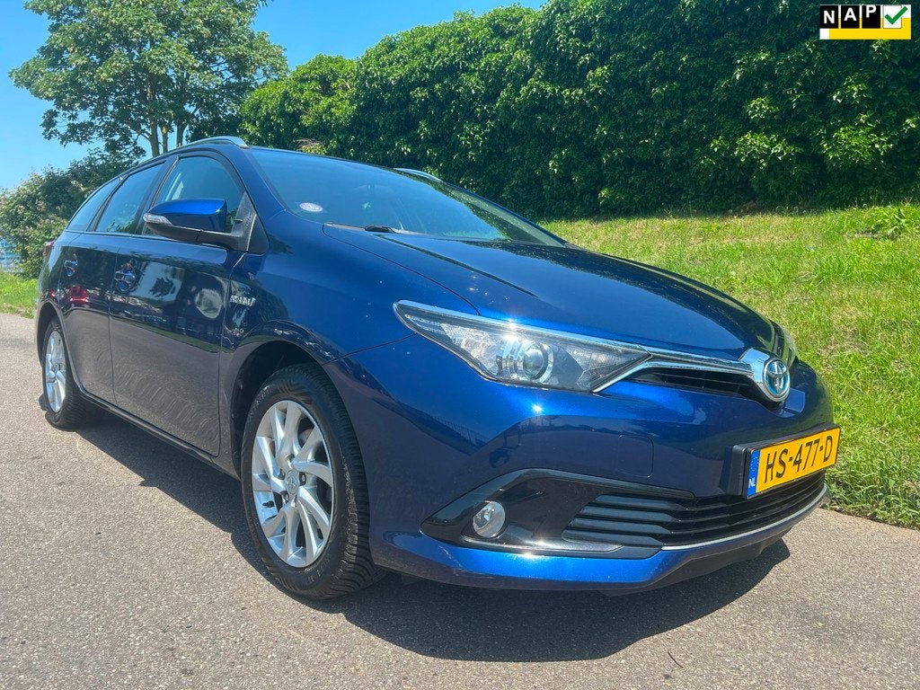 Toyota Auris Touring Sports 1.8 Hybrid Aspiration - Navi - C, Auto's, 28 km/l, Gebruikt, Euro 6, Blauw