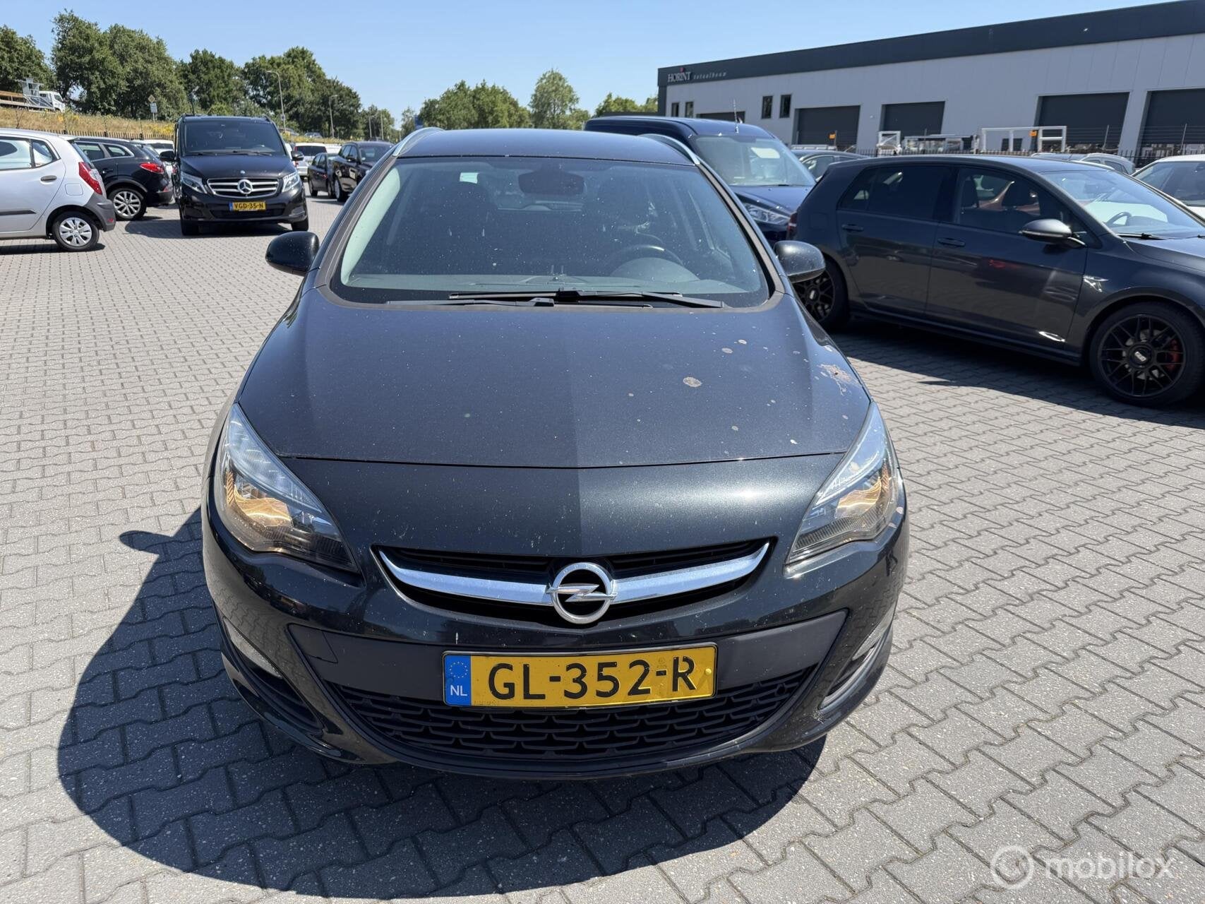 Opel Astra Sports Tourer 1.6 CDTi prijs ex bpm, Auto's, Voorwielaandrijving, Gebruikt, 4 cilinders, Zwart
