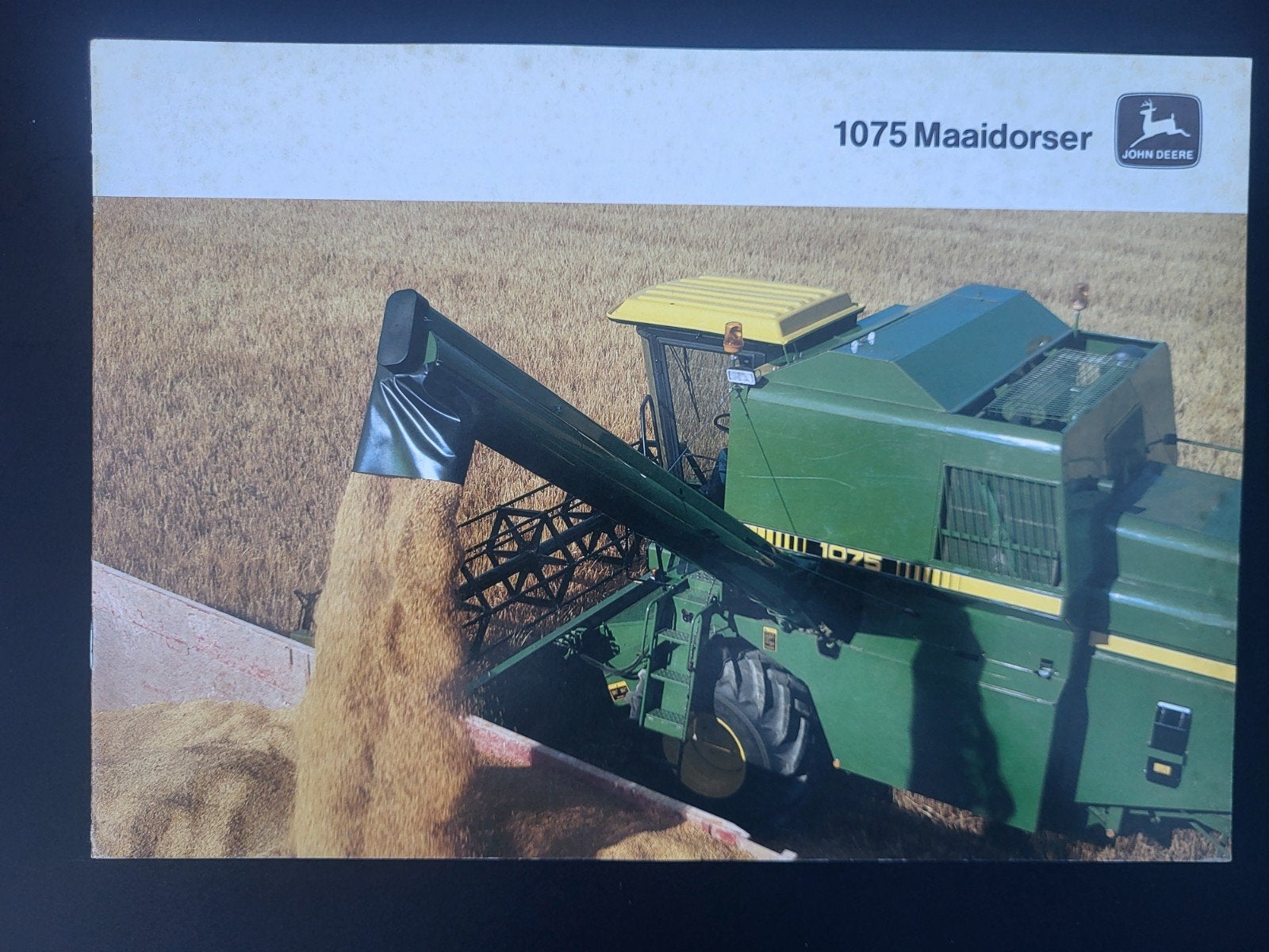 tractor folder John Deere 1075 maaidorser, Boeken, Ophalen of Verzenden, Zo goed als nieuw