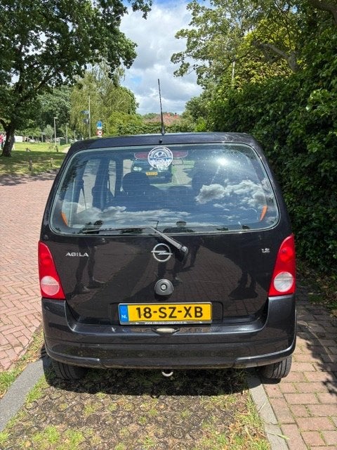 Opel Agila 1.2 (2006) - APK tot juli '27 -  Net nieuwe Accu, Auto's, Voorwielaandrijving, 40 €/maand, 4 cilinders, 1229 cc