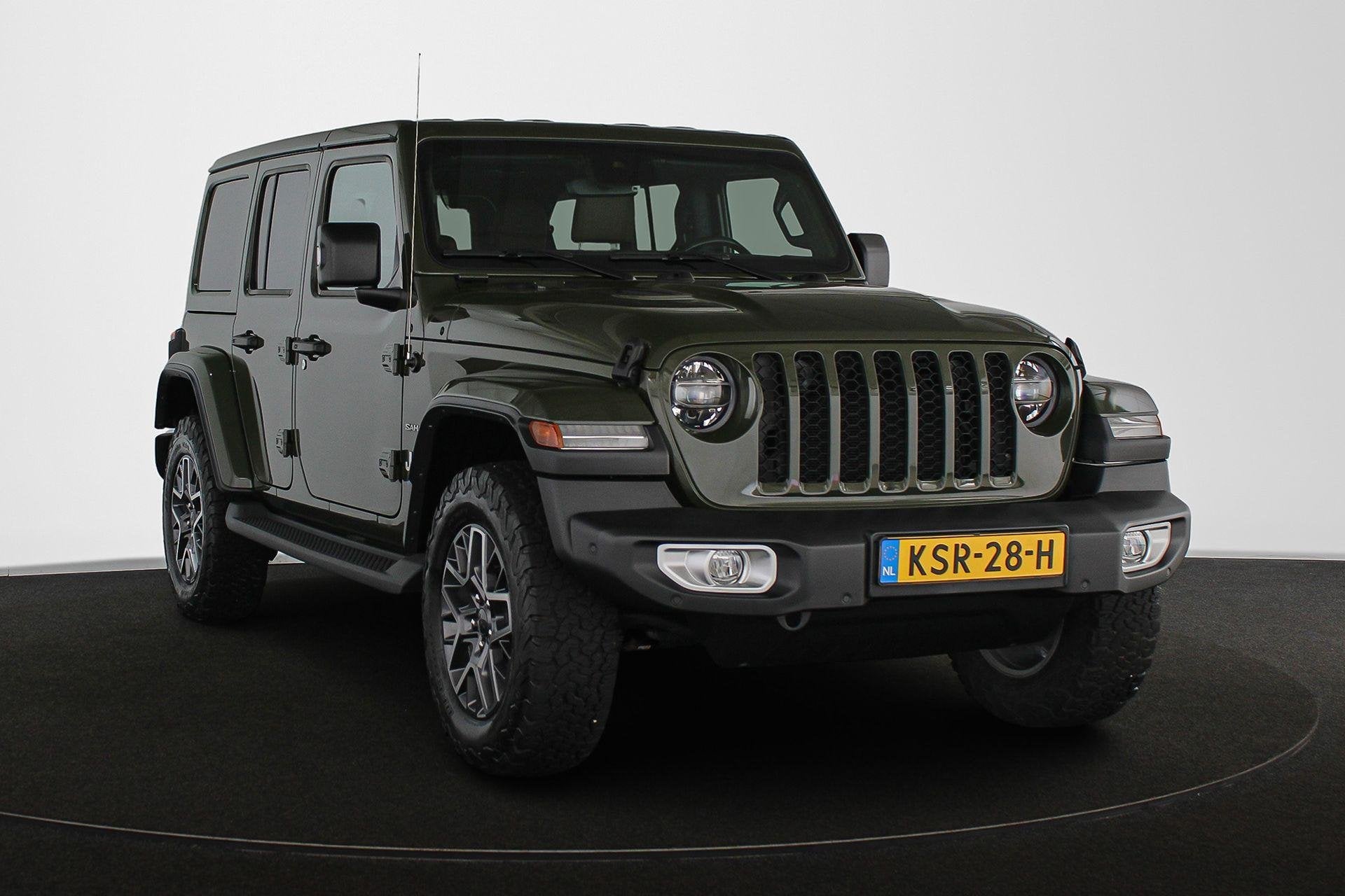 Jeep Wrangler Unlimited 4xe 380 Sahara Leder Stuur-Stoelverw, Auto's, Jeep, Automaat, Euro 6, 4 cilinders, Cabriolet