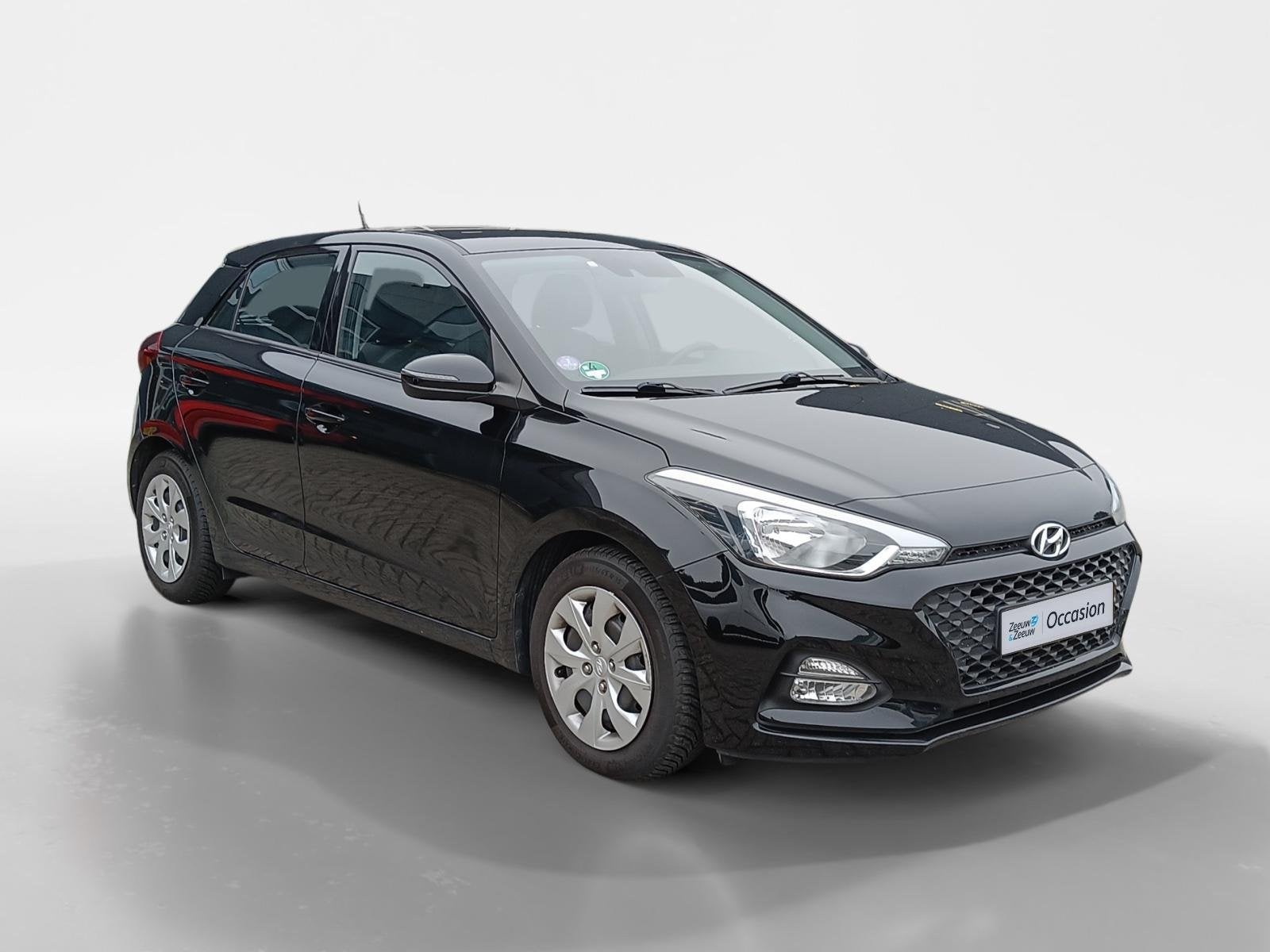 Hyundai i20 1.0 T-GDI Comfort Automaat | All weatherbanden |, 12 maanden, Verwarmde buitenspiegels, Zwart, Origineel Nederlands