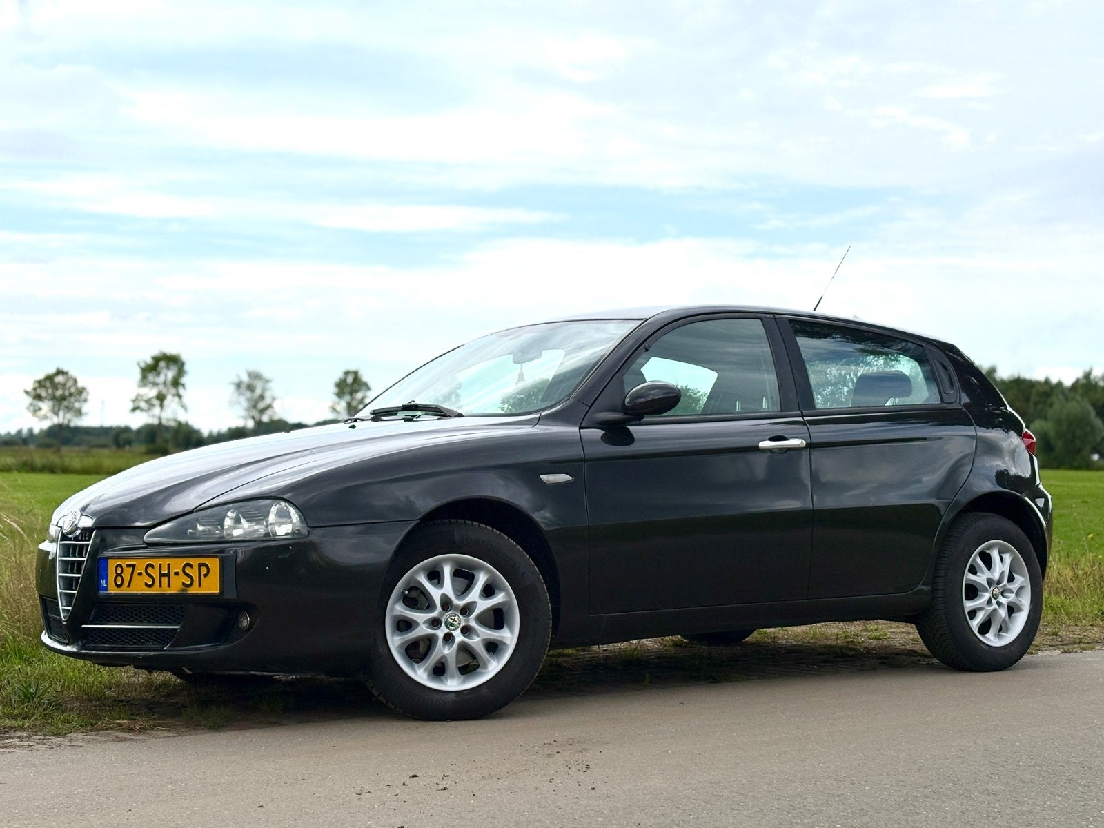 Alfa Romeo 147 1.6 T.spark 16V 88KW 5DR 2006 Zwart, Voorwielaandrijving, 1195 kg, Zwart, 4 cilinders