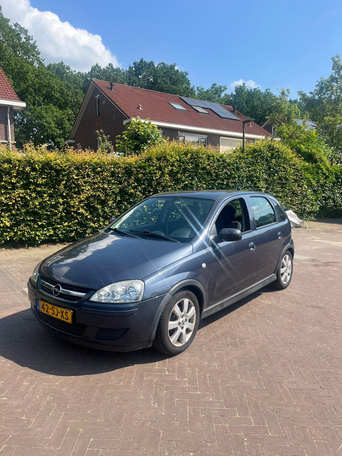Opel Corsa 1.2 16V Twinport 5D 2006 Grijs, Auto's, Voorwielaandrijving, 450 kg, 31 €/maand, 4 cilinders