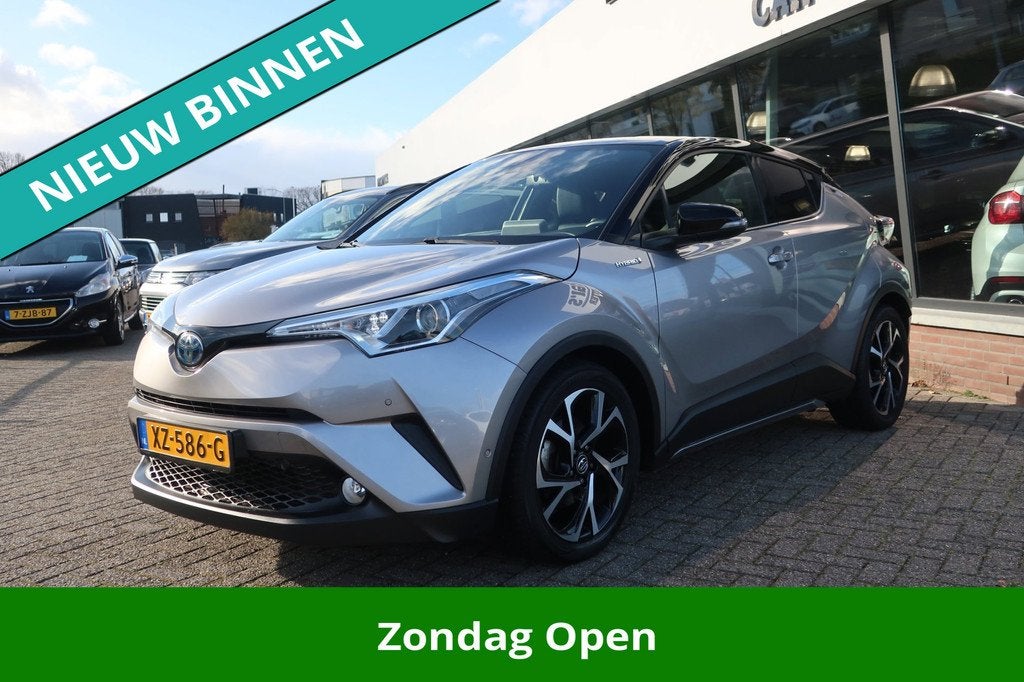 Toyota C-HR 1.8 Hybrid Style 2e EIG_LED_JBL_LEDER_CAM_NAVI., Auto's, 4 cilinders, Automatische klimaatregeling, 26 km/l, Hybride Elektrisch/Benzine