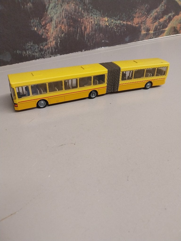 Te koop Volvo geledebus metaal 1/50 ned. uitv. van NZG, Hobby en Vrije tijd, Ophalen of Verzenden, Nieuw, Hijskraan, Tractor of Landbouw