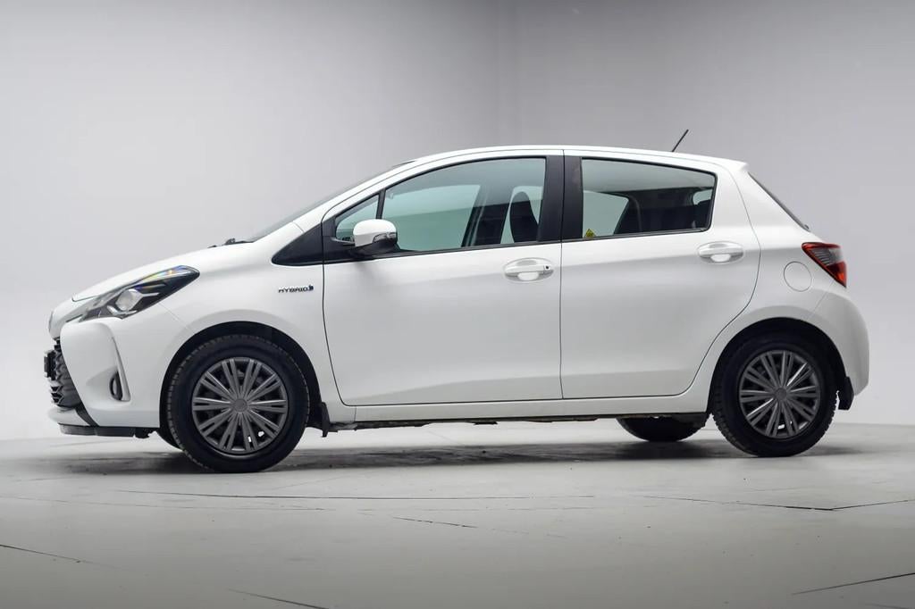 Toyota Yaris 1.5 Hybrid Business Aut [ Navi Camera Stoelverw, Auto's, Toyota, 1497 cc, Gebruikt, Wit, Bedrijf