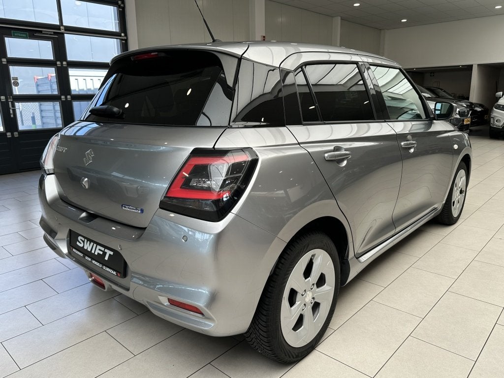 Suzuki Swift 1.2 Select Hybride [ ALL-SEASON BANDEN I CARPLA, Auto's, 12 maanden, Stof, Gebruikt, 82 pk