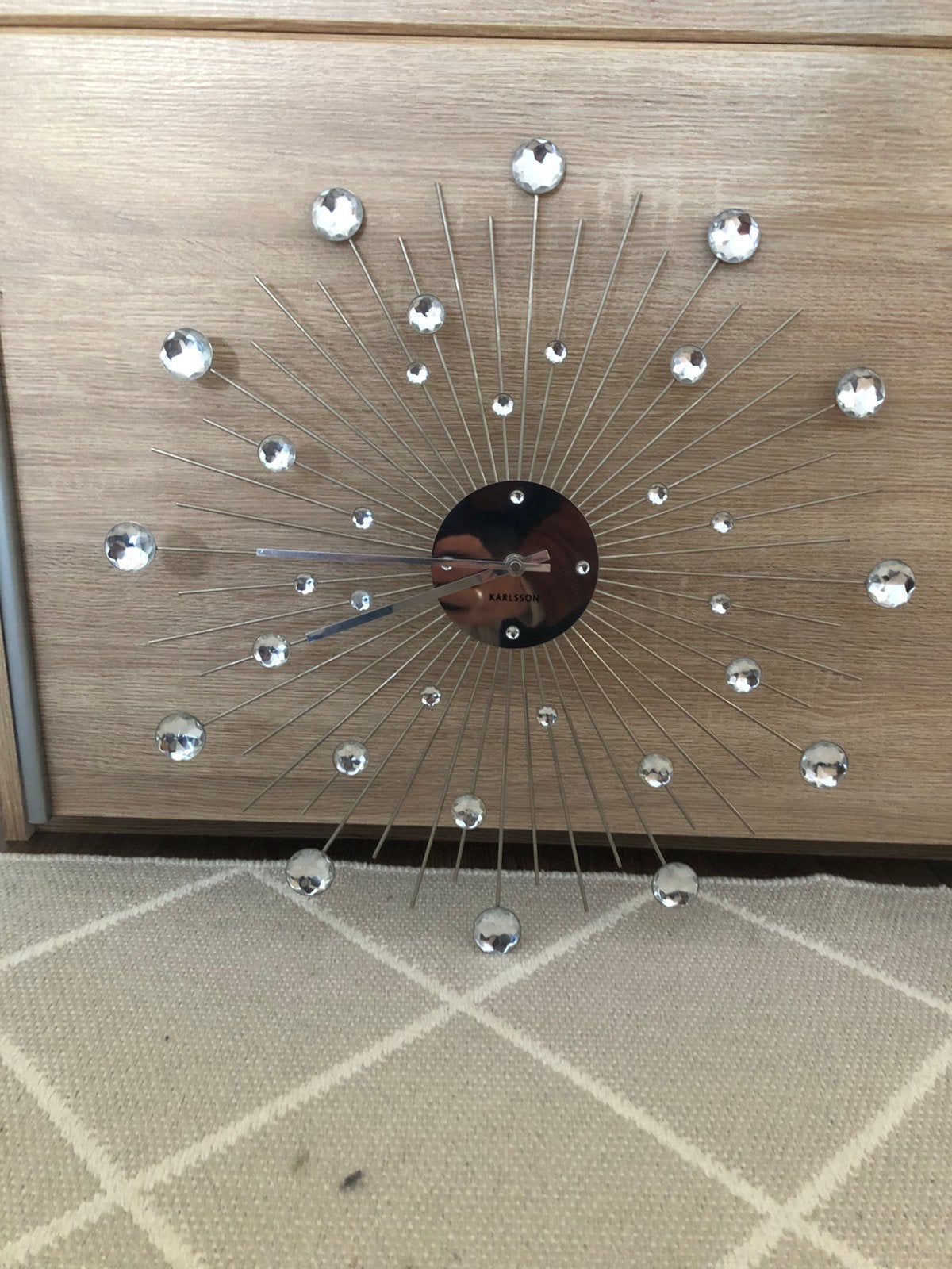 Wandklok karlsson sunburst 50 cm zilver, Ophalen of Verzenden, Zo goed als nieuw, Analoog, Wandklok