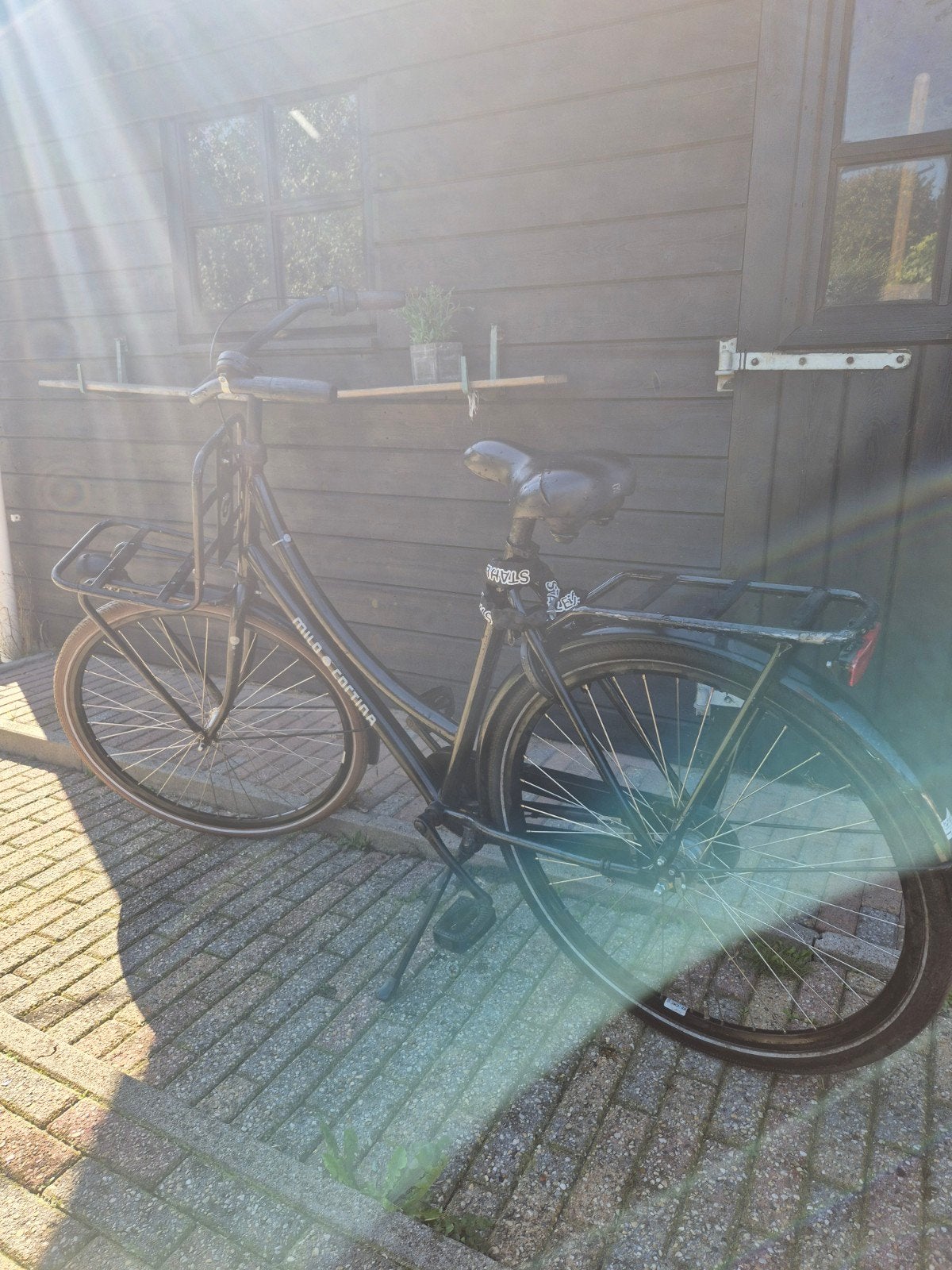 Cortina Milo transportfiets 27 inch met gebruikerssporen