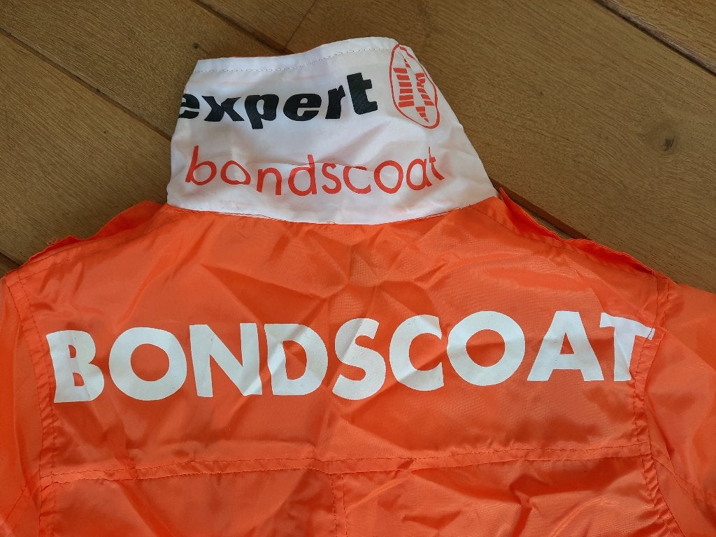 Oranje voetbal - Bondscoat regenjas maat 128/140 - Nieuw -, Ophalen of Verzenden, Nieuw, Oranje of Koningsdag