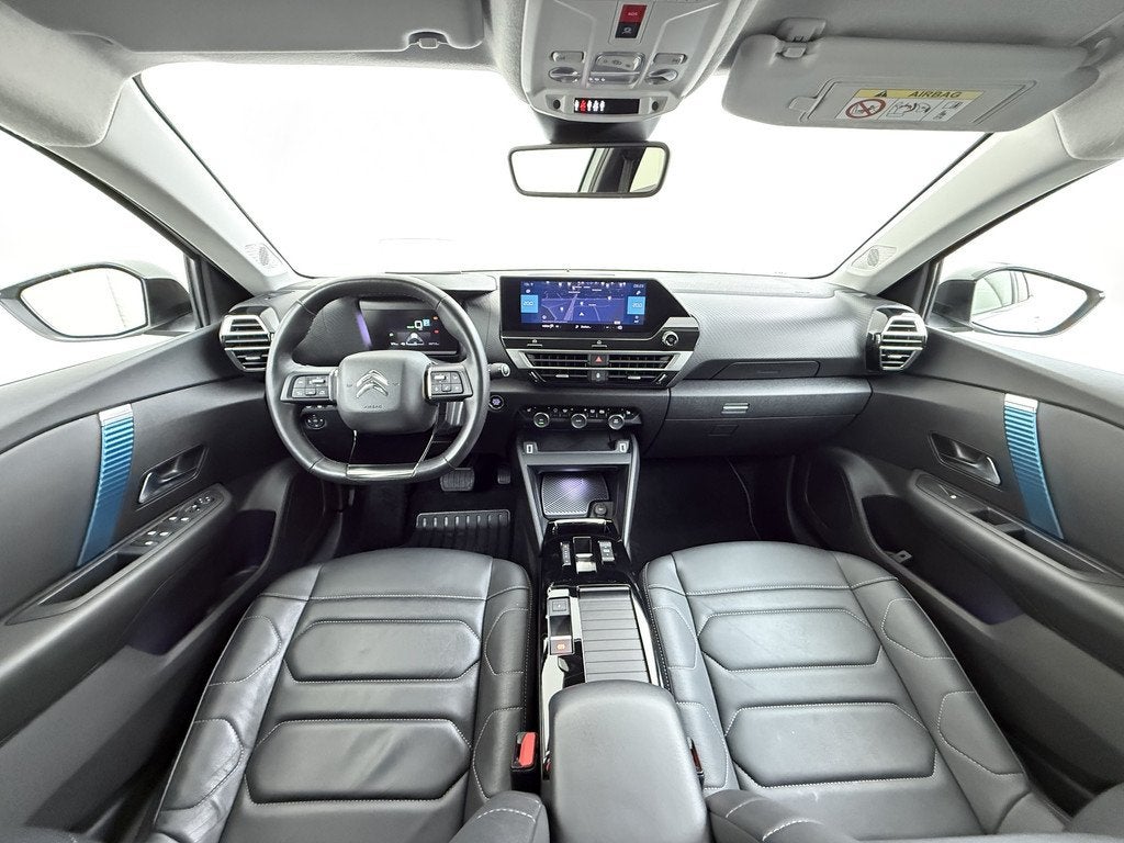 Citroën Ë-C4 Shine 50kWh Leer+Verwarmd Adaptive-Cr. 3D-Nav, Auto's, Citroën, 136 pk, Gebruikt, Zwart, 24 min