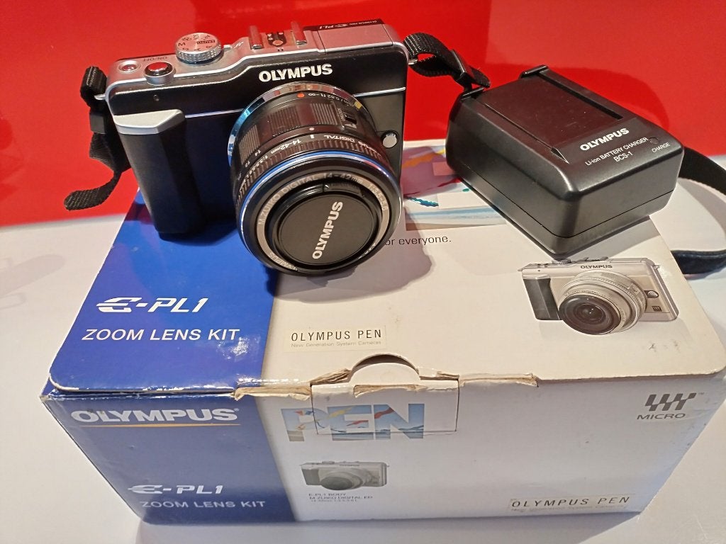 Olympus PEN E-PL1 (zoom lens kit met 14/42 mm lens), 12 megapixels, Ophalen of Verzenden, Zo goed als nieuw, Olympus