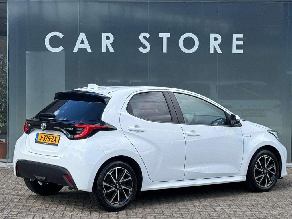 Toyota Yaris 1.5 AUT Hybrid STYLE Navi|Carplay|Camera|ACC|De, Gebruikt, 450 kg, Bedrijf, 93 pk