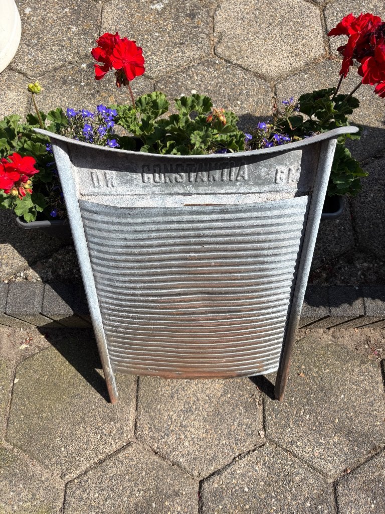 Zinken wasbord, Ophalen