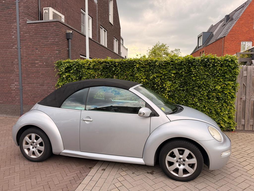 Volkswagen Beetle (Kever) 1.6 Cabriolet 75KW 2006 Grijs, Stof, 4 cilinders, Cabriolet, 4 stoelen