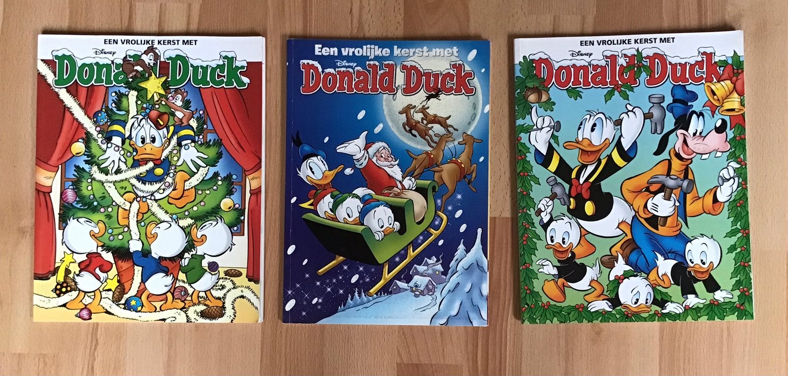 3 x Een vrolijke kerst met Donald Duck 2018, 2021 en 2022, Meerdere stripboeken, Ophalen of Verzenden, Zo goed als nieuw, Donald Duck