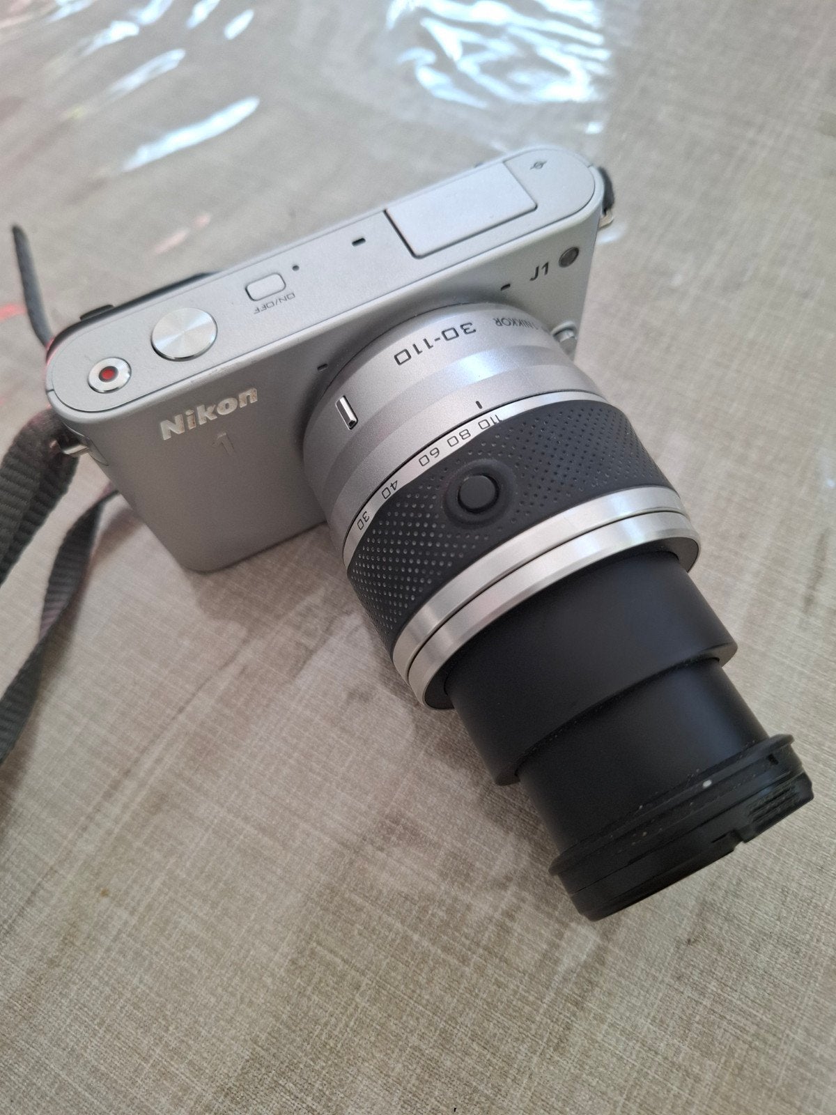 Goed uitziende Nikon j1 camera met telelens 30-110, Ophalen of Verzenden