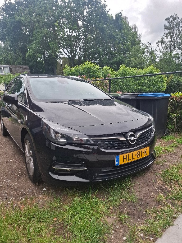 Opel Astra 1.2 Turbo 110pk 2021 Zwart weinig kilometers!!!, Voorwielaandrijving, 1199 cc, Leder en Stof, Zwart