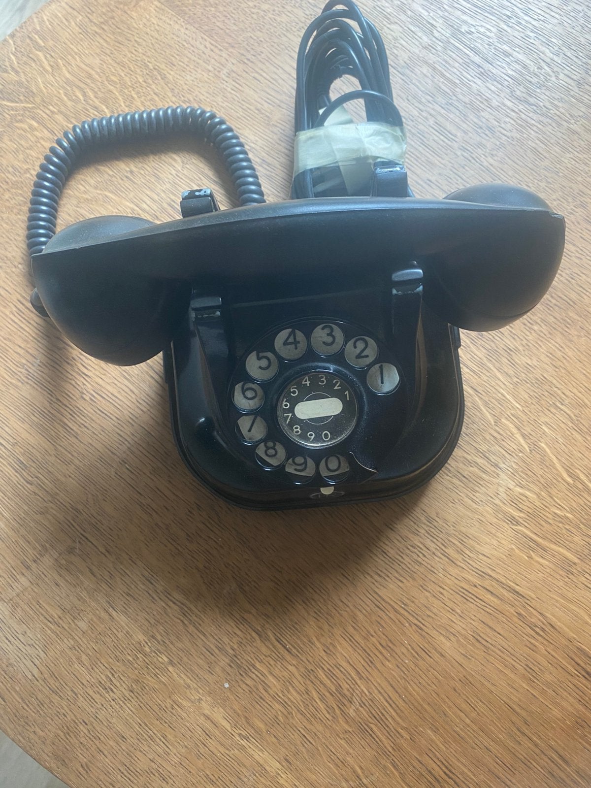 Bakeliet telefoon, Ophalen, Zo goed als nieuw
