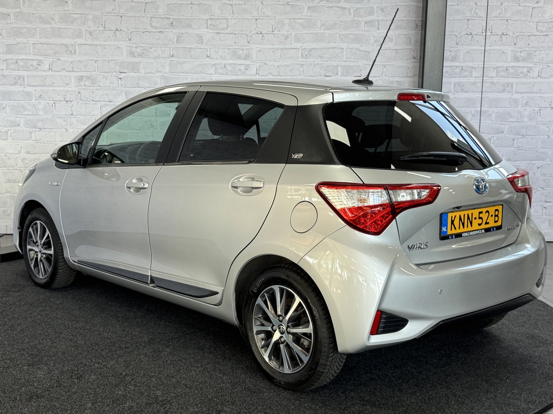 Toyota Yaris 1.5 Hybrid Y20 Keyless Navi Automaat (bj 2020), Gebruikt, 4 cilinders, Bedrijf, Hybride Elektrisch/Benzine