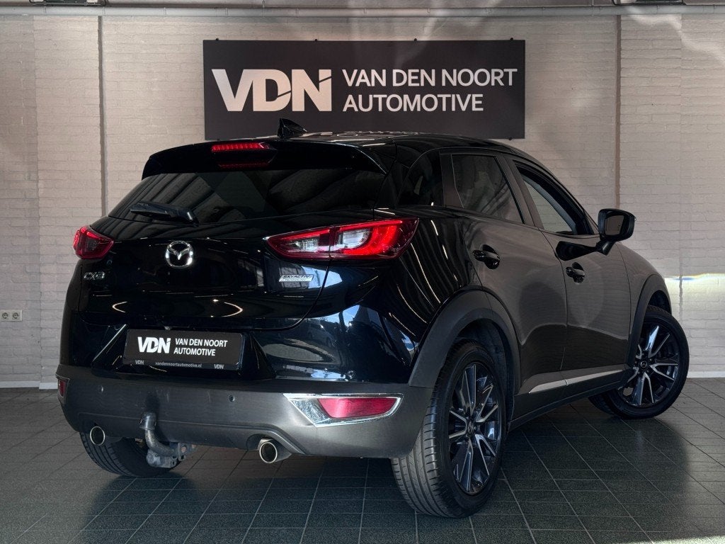Mazda CX-3 2.0 SkyActiv-G 120 GT-Luxury Bose Trekhaak HUD Le, 1998 cc, 4 cilinders, Met garantie (alle), Zwart