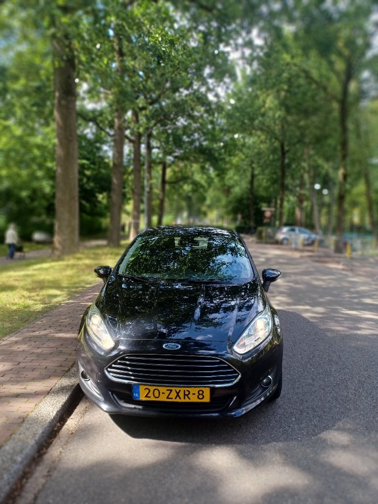 Ford Fiësta 1.6TDCI 70KW 3DR 2013 Zwart, Bi-Xenon koplampen, Achterwielaandrijving, 96 €/maand, Leder en Stof