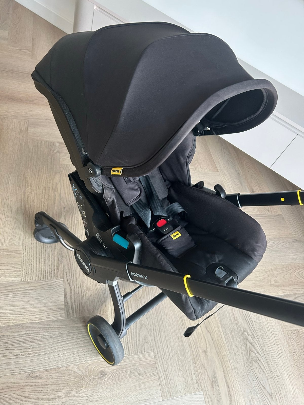 Doona X autostoel en kinderwagen in één (Zwart), Overige merken, Ophalen of Verzenden, Zo goed als nieuw, Combiwagen