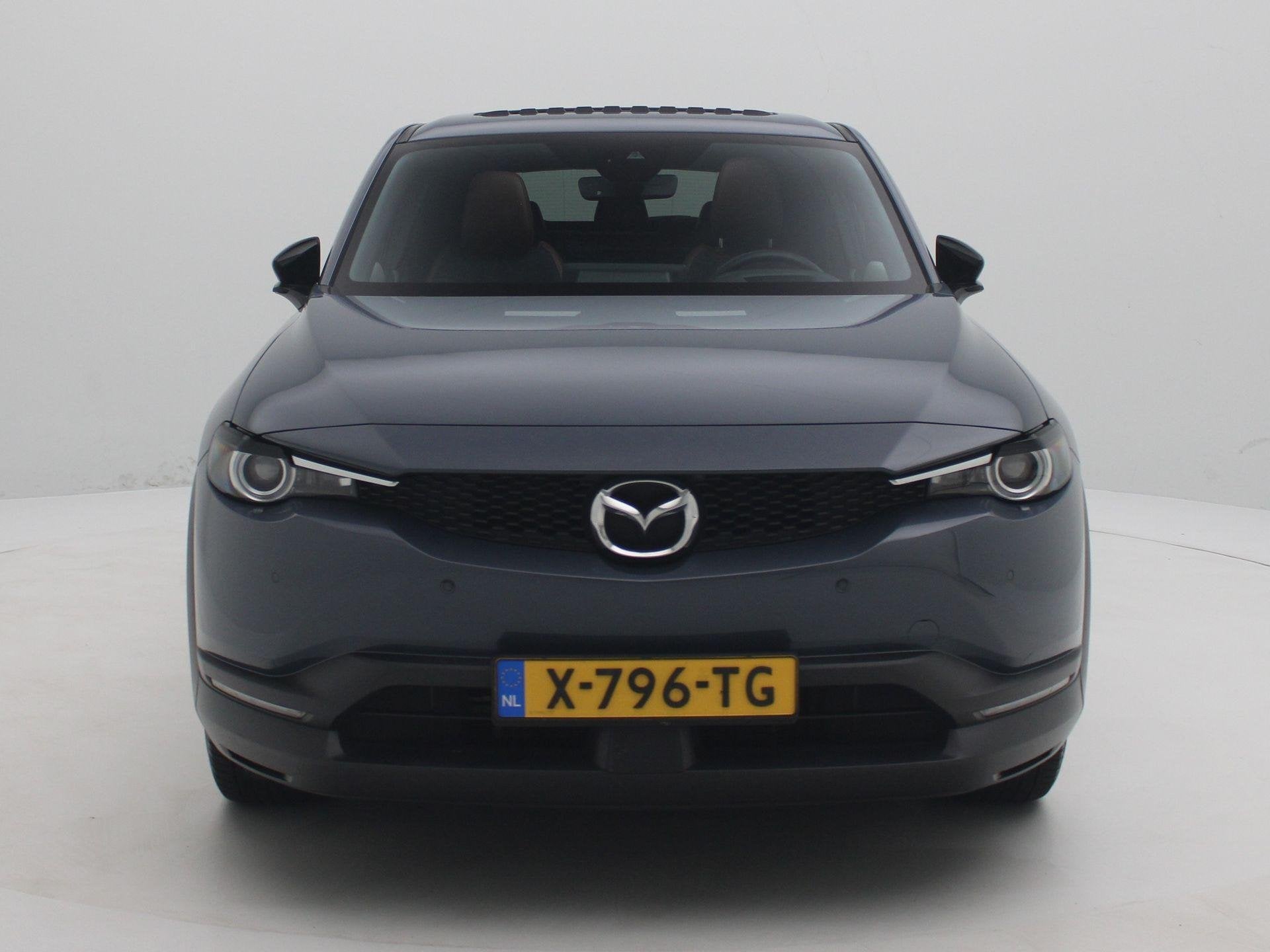 Mazda MX-30 e-SkyActiv R-EV 170 Makoto | Navi | Premium Pack, Auto's, Mazda, Gebruikt, Leder en Stof, Bedrijf, Hybride Elektrisch/Benzine