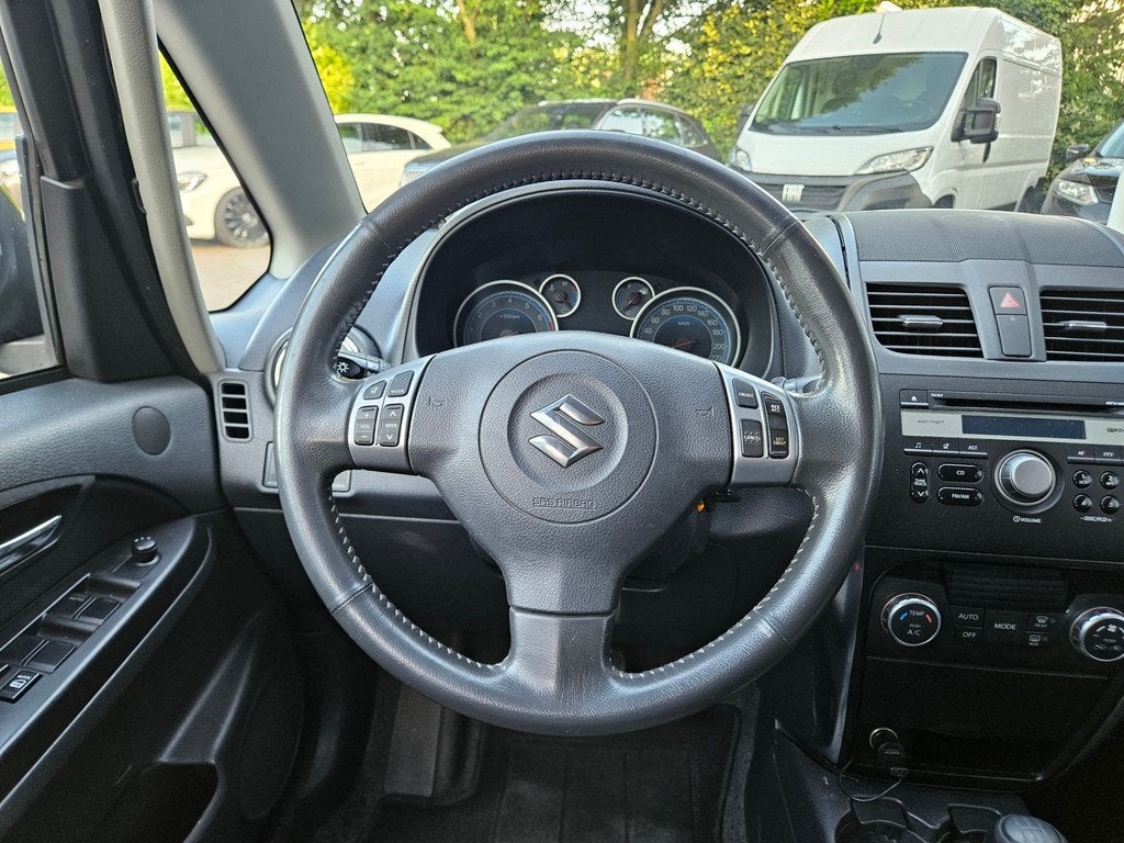 Suzuki SX4 1.6 Arrow Trekhaak! Airco/Clima! Cruise Control!, Auto's, Voorwielaandrijving, Euro 5, Metallic lak, Gebruikt