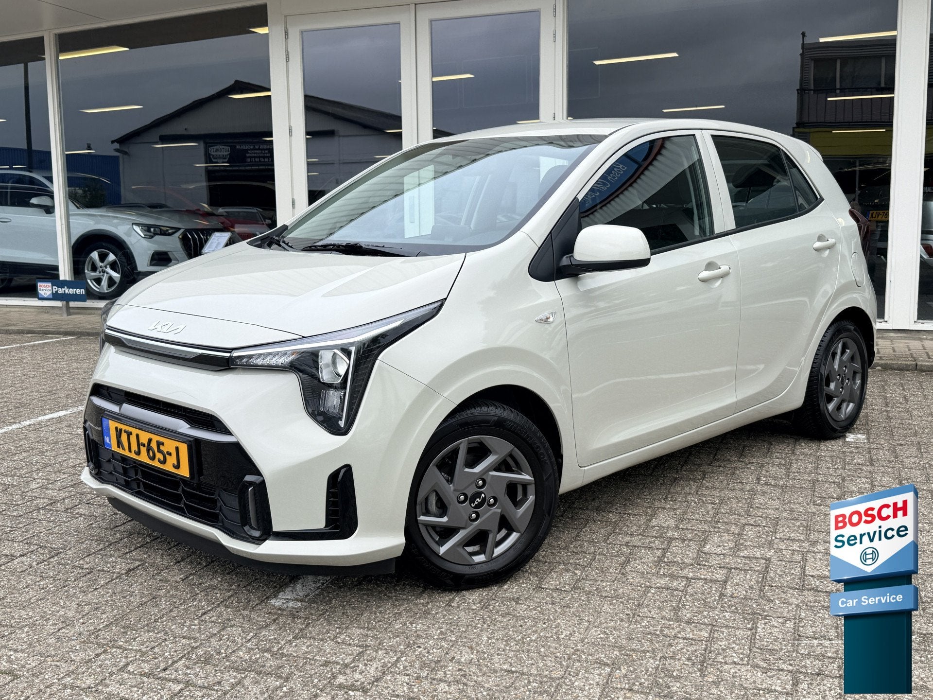 Kia Picanto 1.0 DPI DynamicLine | Stoel- en stuurverwarming, Auto's, Dealer onderhouden, Euro 6, 4 stoelen, Leder en Stof