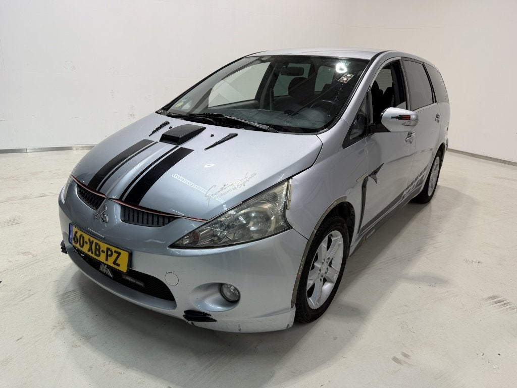 Mitsubishi Grandis 2.4-16V Intense (bj 2007), Auto's, Stof, Gebruikt, 7 stoelen, Bedrijf